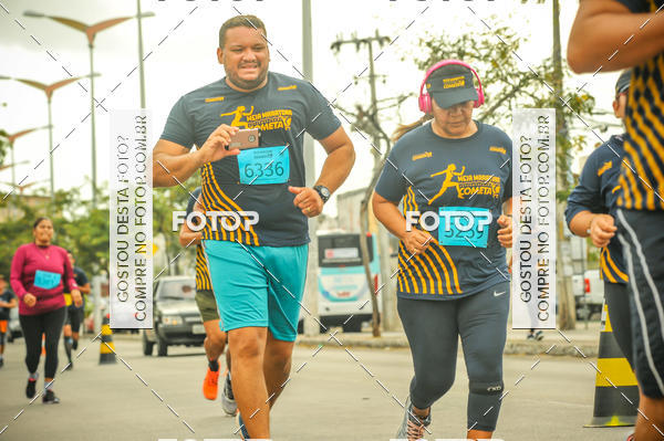 Buy your photos of the eventMEIA MARATONA COMETA on Fotop