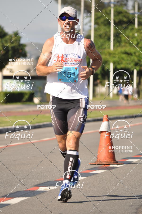 Buy your photos of the event21KES - Meia Maratona do Esprito Santo on Fotop