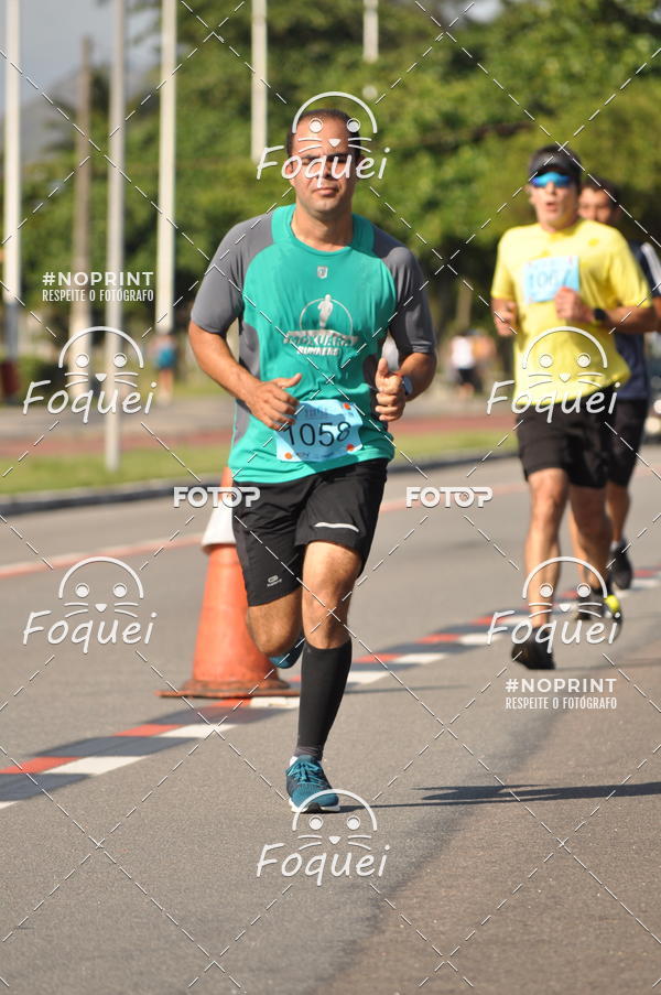 Buy your photos of the event21KES - Meia Maratona do Esprito Santo on Fotop