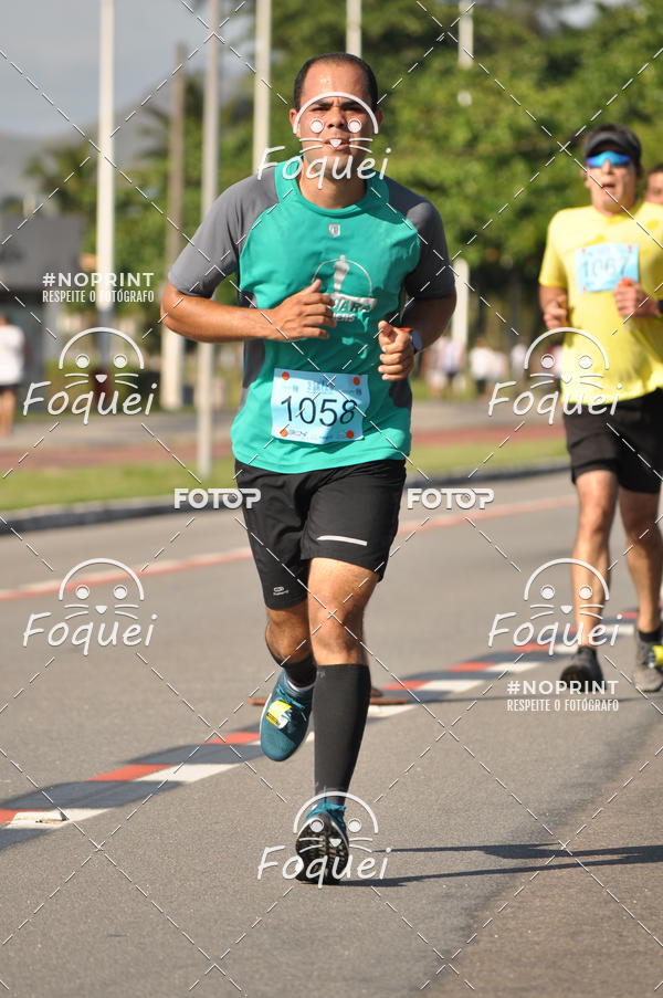 Buy your photos of the event21KES - Meia Maratona do Esprito Santo on Fotop
