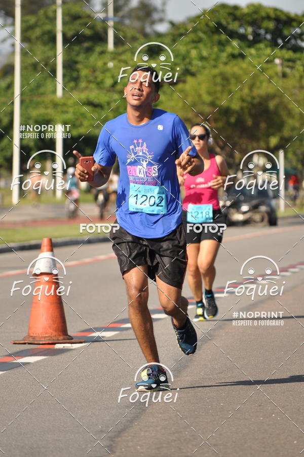Buy your photos of the event21KES - Meia Maratona do Esprito Santo on Fotop