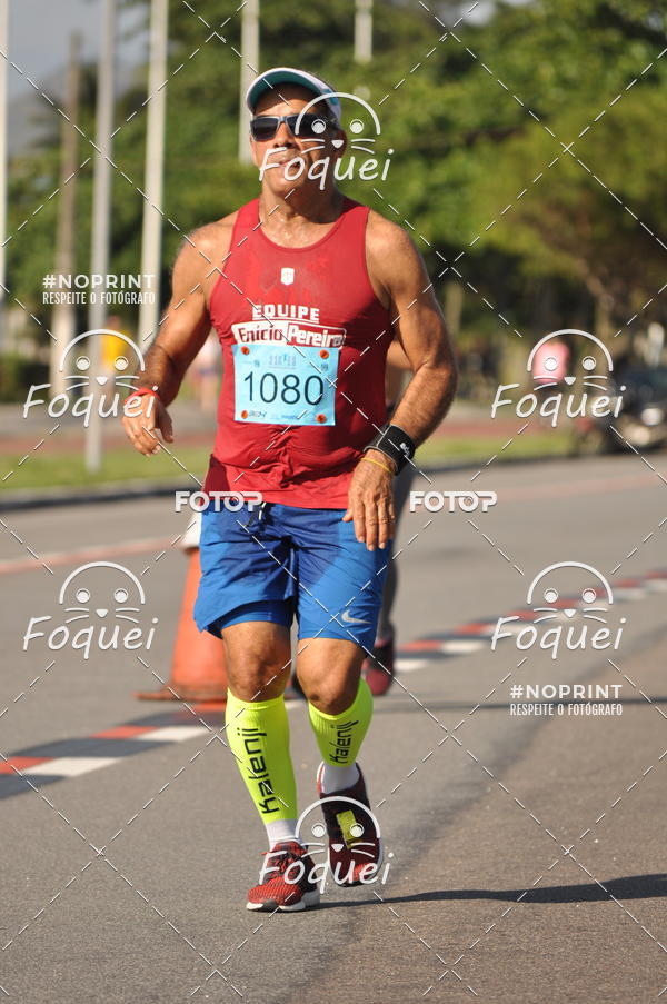Buy your photos of the event21KES - Meia Maratona do Esprito Santo on Fotop