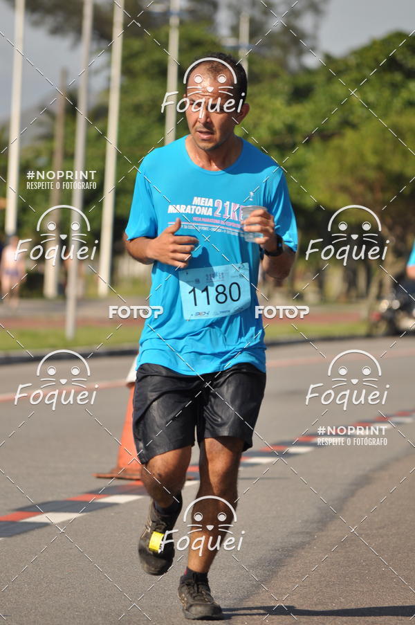 Buy your photos of the event21KES - Meia Maratona do Esprito Santo on Fotop