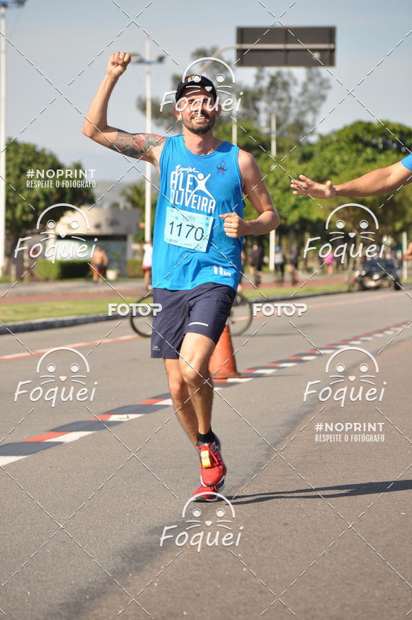 Buy your photos of the event21KES - Meia Maratona do Esprito Santo on Fotop