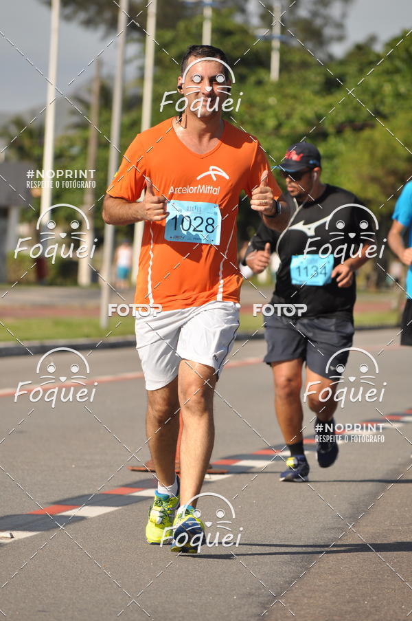 Buy your photos of the event21KES - Meia Maratona do Esprito Santo on Fotop