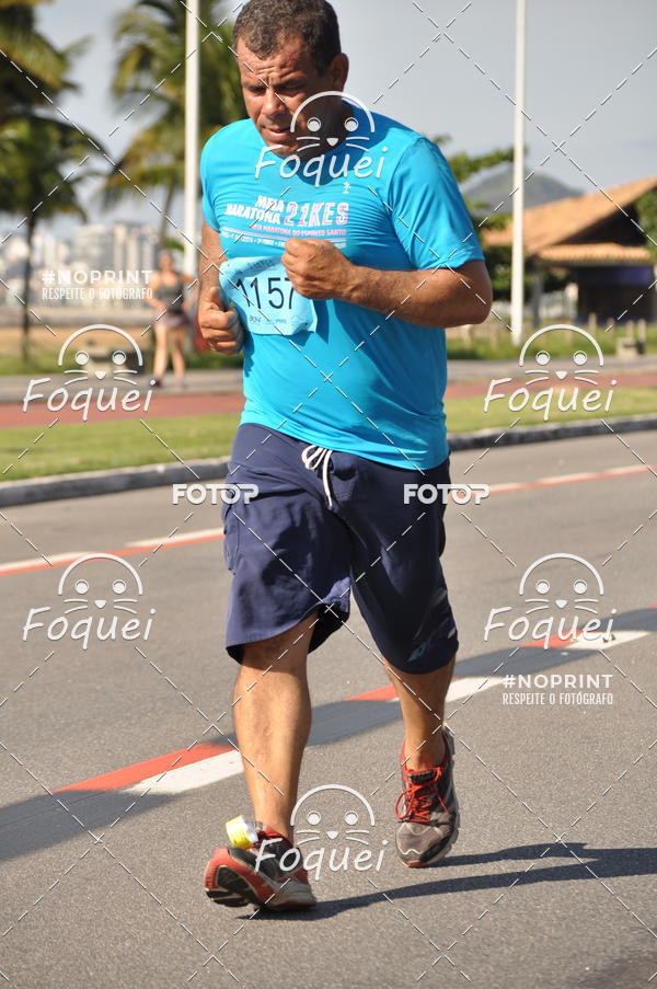 Buy your photos of the event21KES - Meia Maratona do Esprito Santo on Fotop