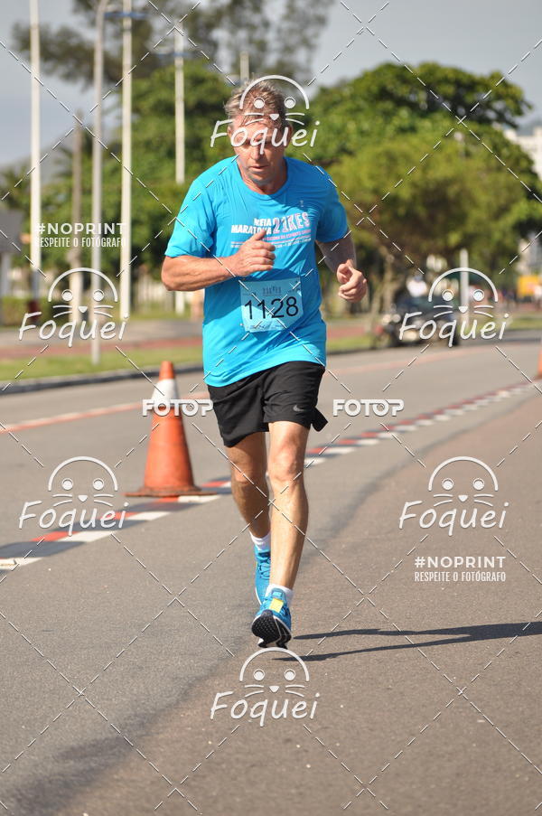 Buy your photos of the event21KES - Meia Maratona do Esprito Santo on Fotop