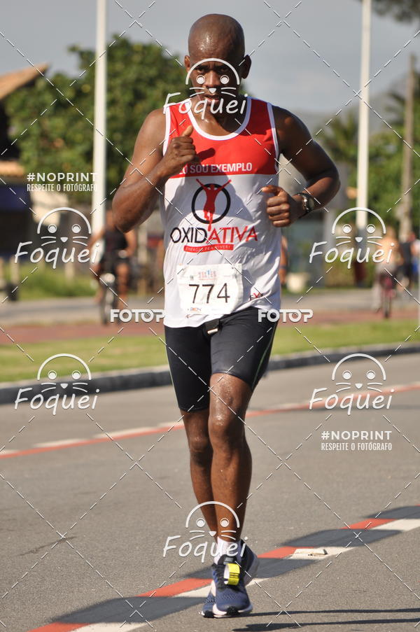 Buy your photos of the event21KES - Meia Maratona do Esprito Santo on Fotop