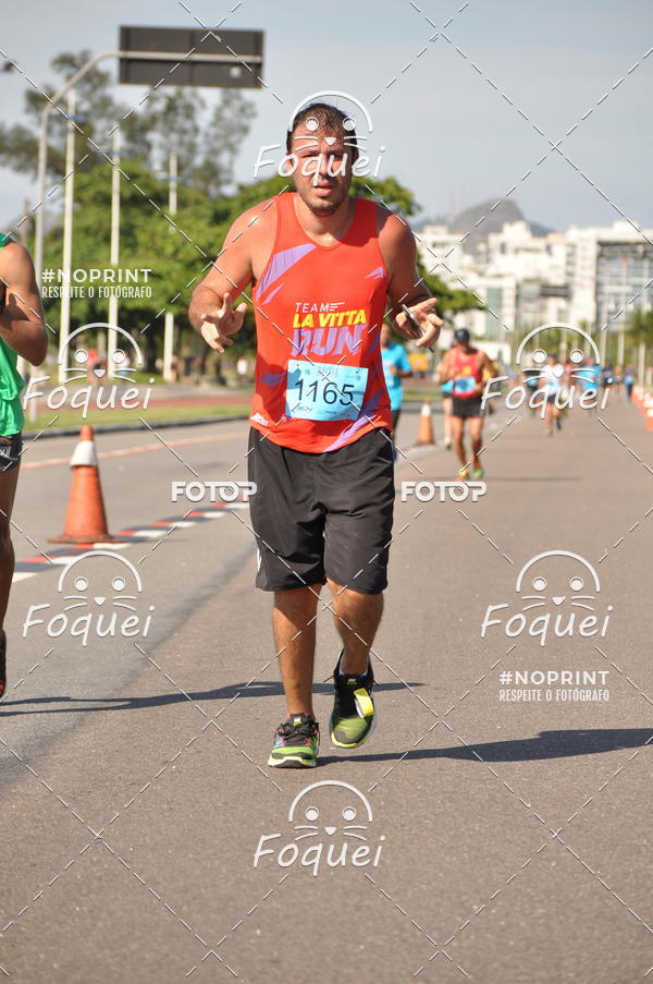 Buy your photos of the event21KES - Meia Maratona do Esprito Santo on Fotop