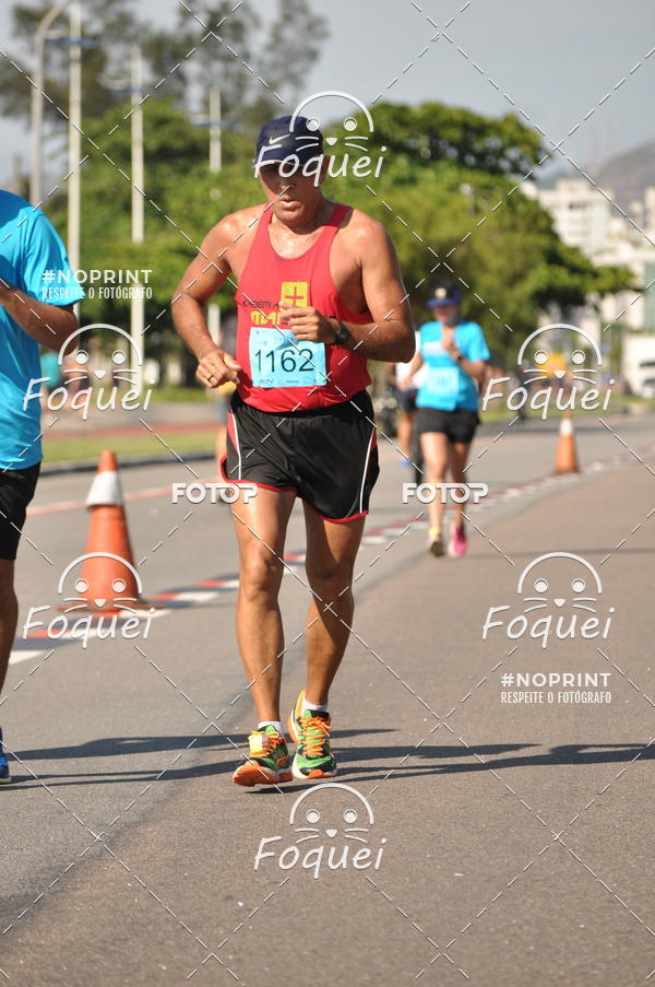 Buy your photos of the event21KES - Meia Maratona do Esprito Santo on Fotop
