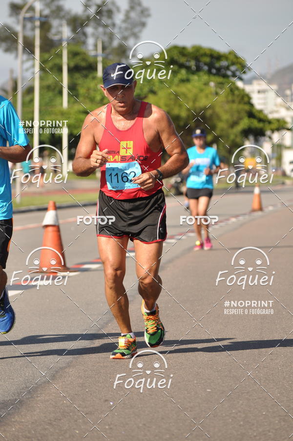 Buy your photos of the event21KES - Meia Maratona do Esprito Santo on Fotop