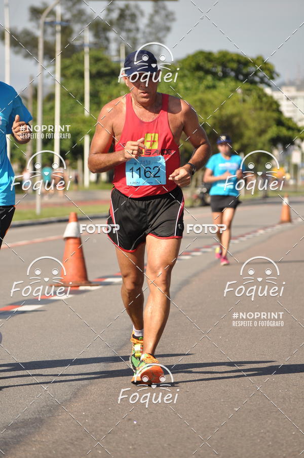 Buy your photos of the event21KES - Meia Maratona do Esprito Santo on Fotop