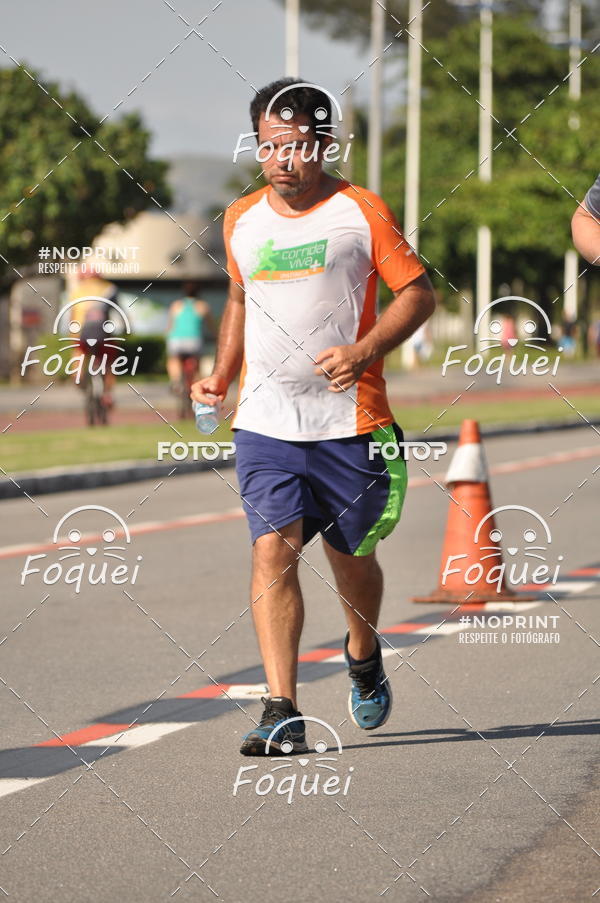 Buy your photos of the event21KES - Meia Maratona do Esprito Santo on Fotop