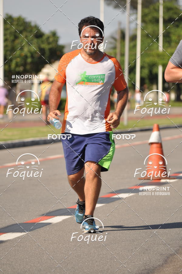 Buy your photos of the event21KES - Meia Maratona do Esprito Santo on Fotop