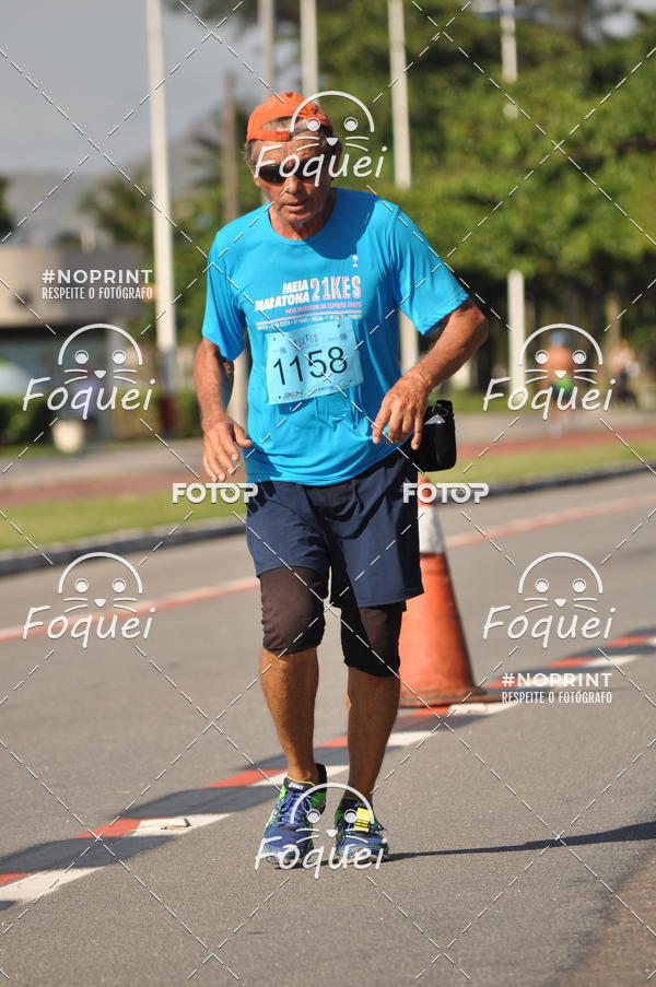 Buy your photos of the event21KES - Meia Maratona do Esprito Santo on Fotop