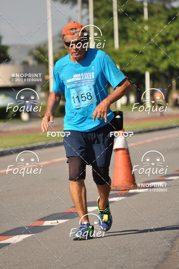 Buy your photos of the event21KES - Meia Maratona do Esprito Santo on Fotop