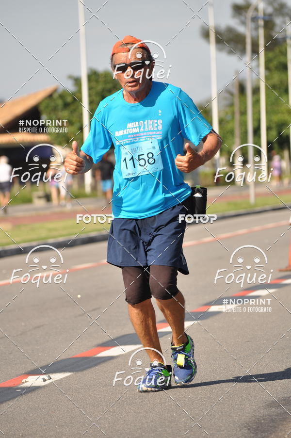 Buy your photos of the event21KES - Meia Maratona do Esprito Santo on Fotop