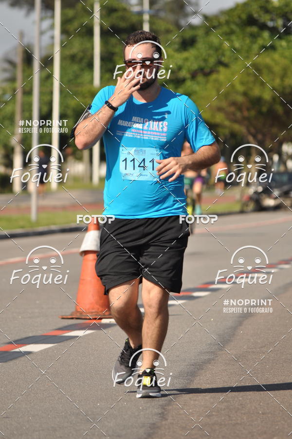 Buy your photos of the event21KES - Meia Maratona do Esprito Santo on Fotop