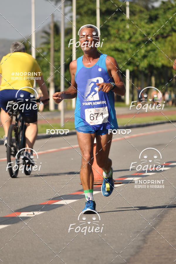 Buy your photos of the event21KES - Meia Maratona do Esprito Santo on Fotop