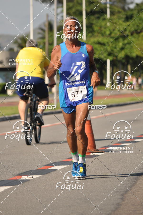 Buy your photos of the event21KES - Meia Maratona do Esprito Santo on Fotop