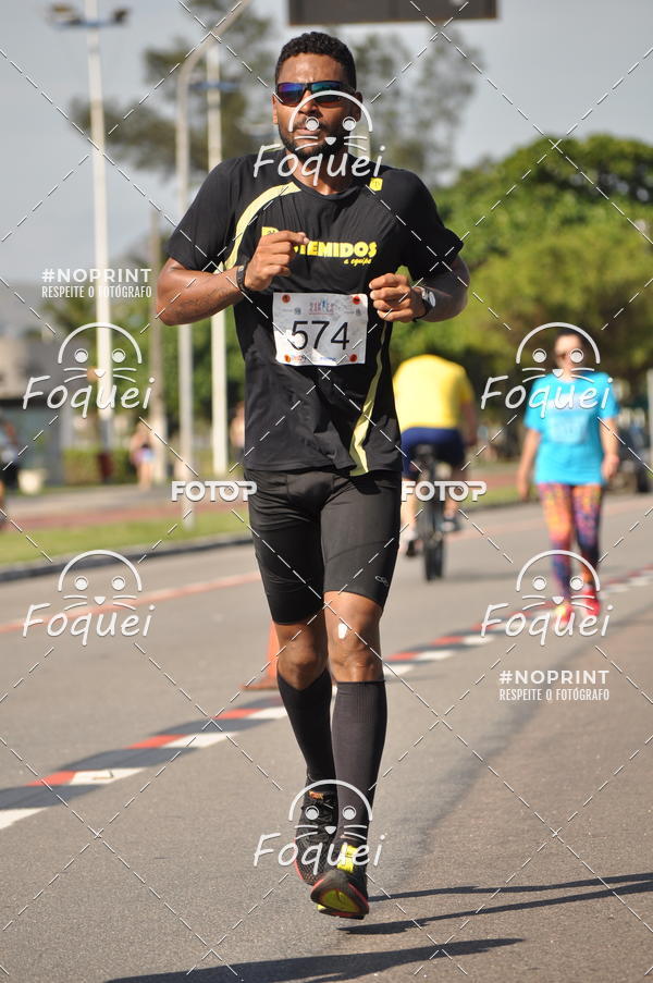 Buy your photos of the event21KES - Meia Maratona do Esprito Santo on Fotop