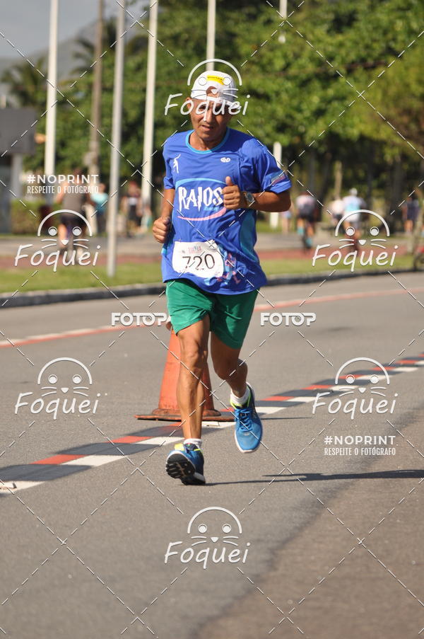 Buy your photos of the event21KES - Meia Maratona do Esprito Santo on Fotop