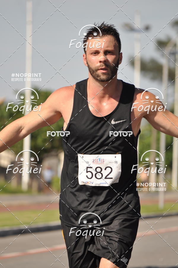 Buy your photos of the event21KES - Meia Maratona do Esprito Santo on Fotop