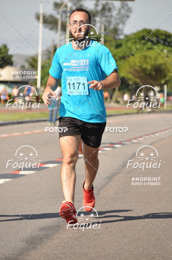 Buy your photos of the event21KES - Meia Maratona do Esprito Santo on Fotop