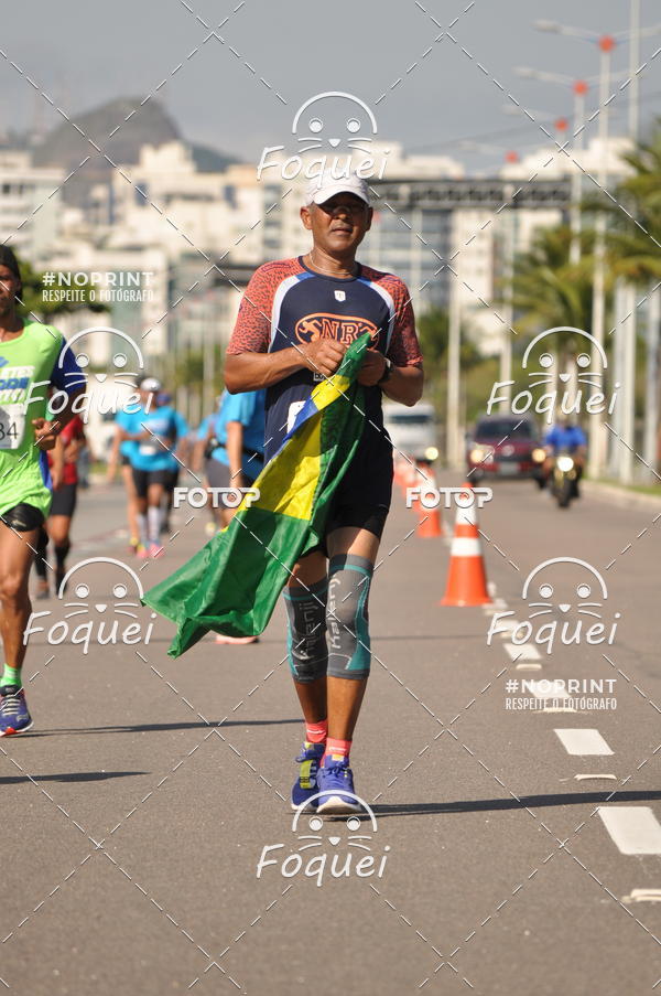 Buy your photos of the event21KES - Meia Maratona do Esprito Santo on Fotop