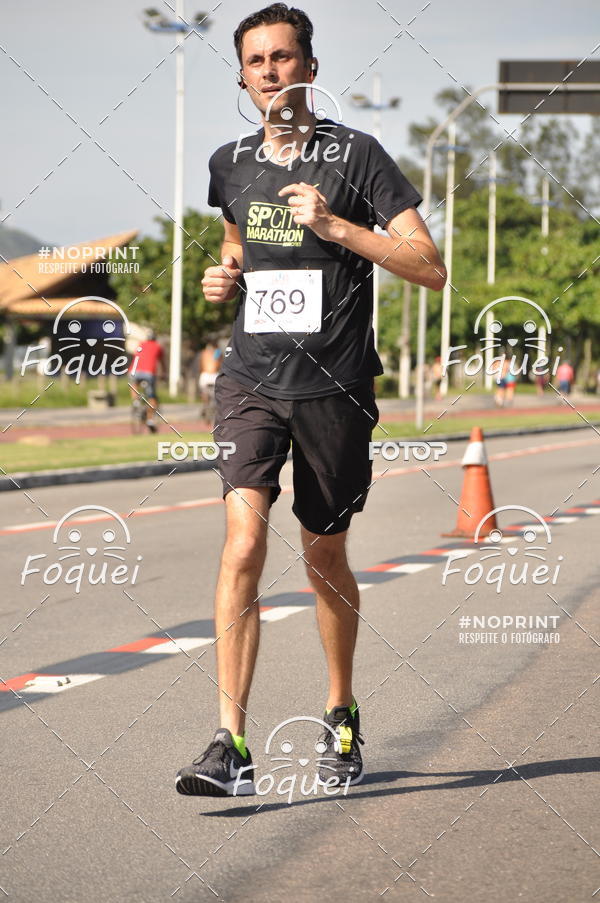 Buy your photos of the event21KES - Meia Maratona do Esprito Santo on Fotop