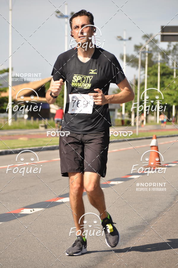 Buy your photos of the event21KES - Meia Maratona do Esprito Santo on Fotop