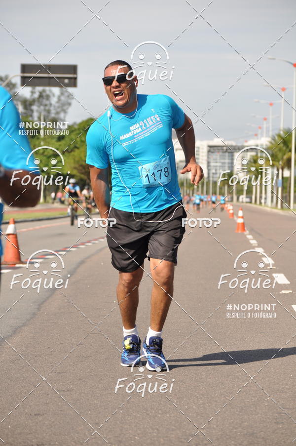Buy your photos of the event21KES - Meia Maratona do Esprito Santo on Fotop