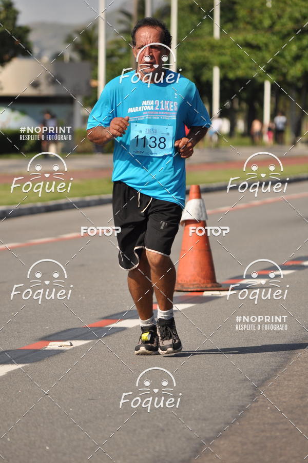 Buy your photos of the event21KES - Meia Maratona do Esprito Santo on Fotop