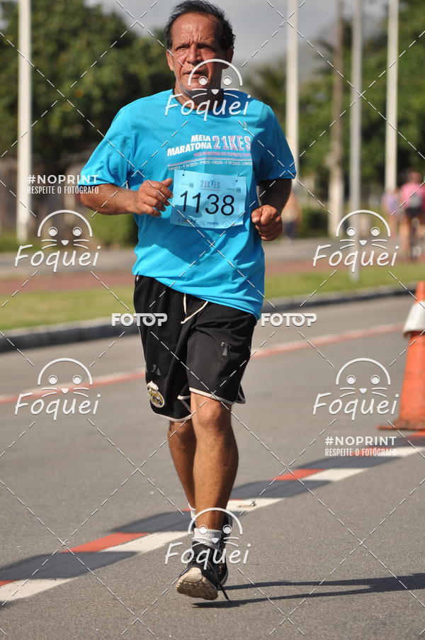 Buy your photos of the event21KES - Meia Maratona do Esprito Santo on Fotop
