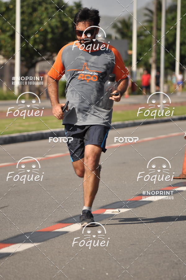 Buy your photos of the event21KES - Meia Maratona do Esprito Santo on Fotop