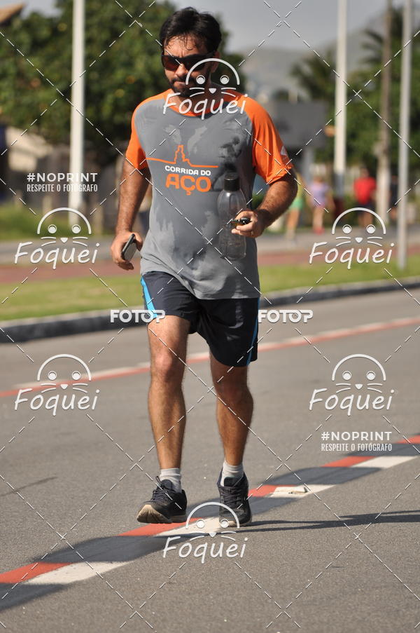 Buy your photos of the event21KES - Meia Maratona do Esprito Santo on Fotop
