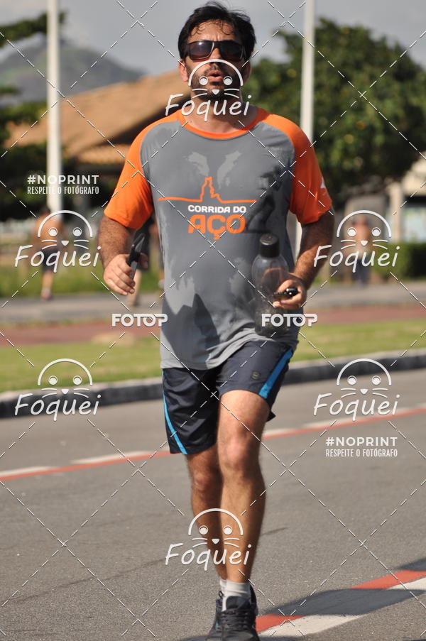 Buy your photos of the event21KES - Meia Maratona do Esprito Santo on Fotop