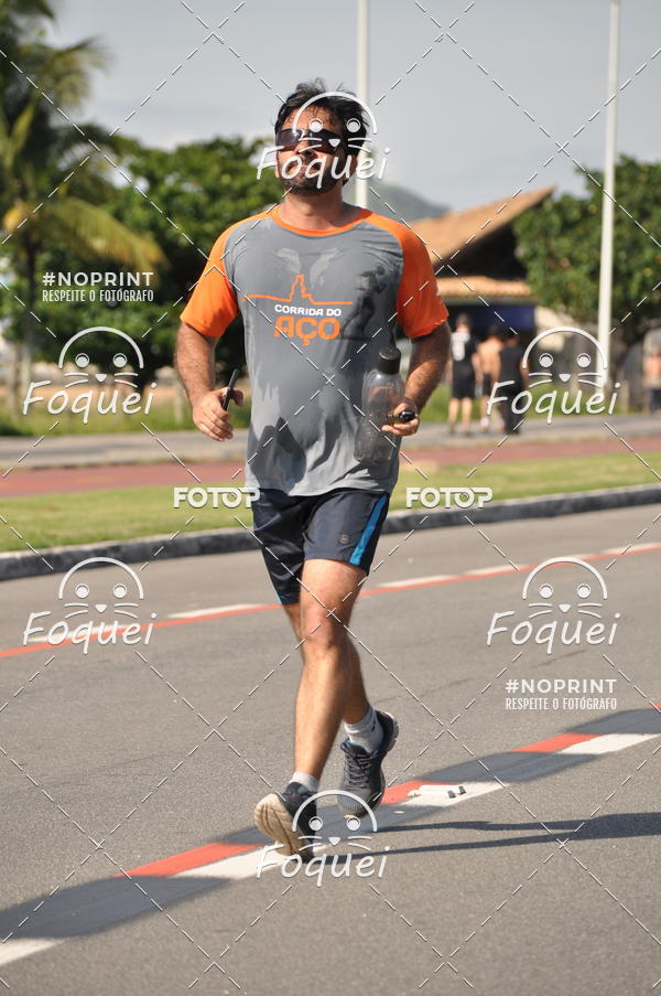 Buy your photos of the event21KES - Meia Maratona do Esprito Santo on Fotop