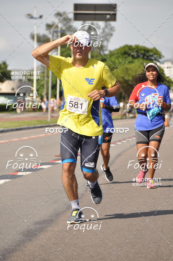 Buy your photos of the event21KES - Meia Maratona do Esprito Santo on Fotop