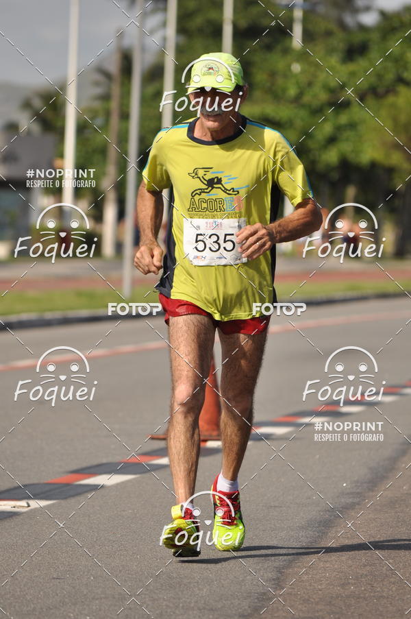 Buy your photos of the event21KES - Meia Maratona do Esprito Santo on Fotop