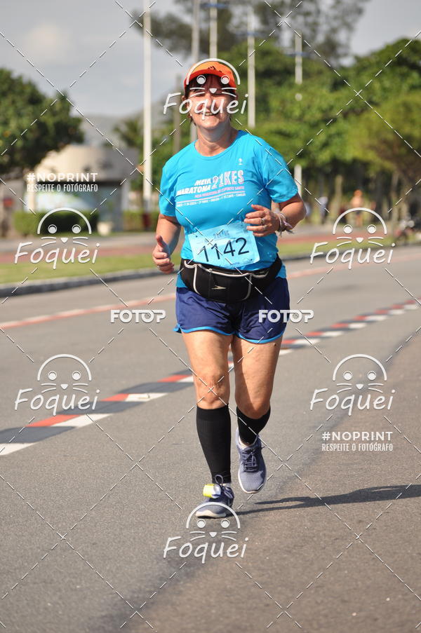 Buy your photos of the event21KES - Meia Maratona do Esprito Santo on Fotop
