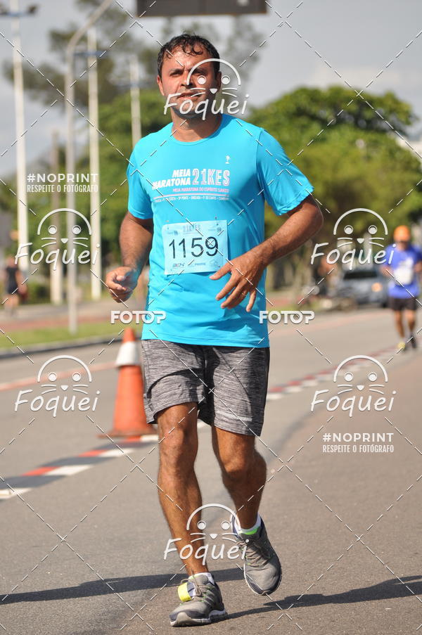 Buy your photos of the event21KES - Meia Maratona do Esprito Santo on Fotop