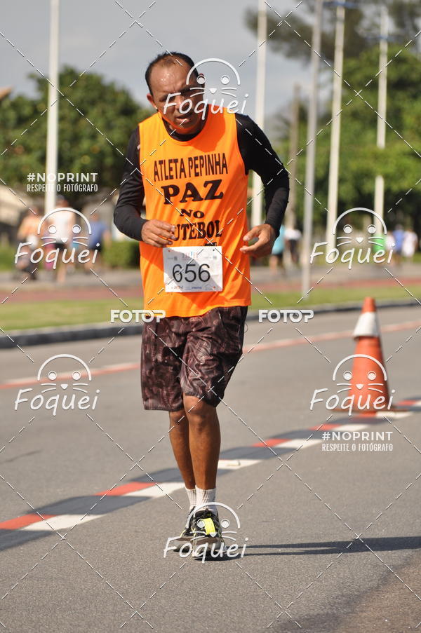 Buy your photos of the event21KES - Meia Maratona do Esprito Santo on Fotop