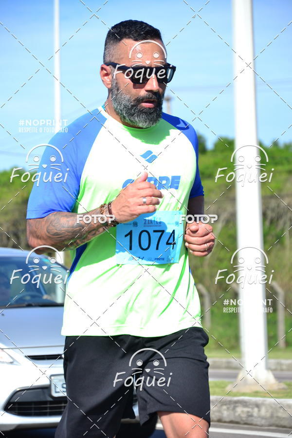 Compra tus fotos del evento21KES - Meia Maratona do Esprito Santo En Fotop