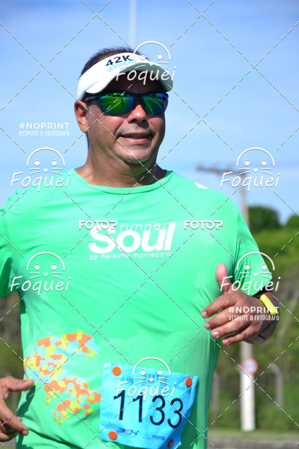 Buy your photos of the event21KES - Meia Maratona do Esprito Santo on Fotop