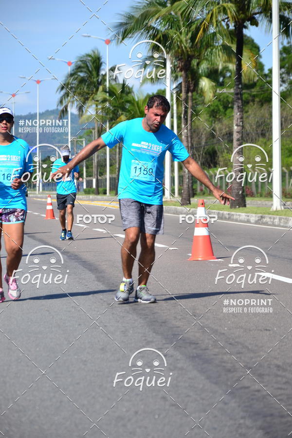Buy your photos of the event21KES - Meia Maratona do Esprito Santo on Fotop