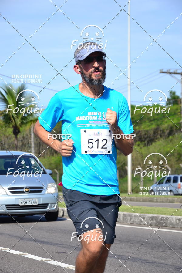 Buy your photos of the event21KES - Meia Maratona do Esprito Santo on Fotop