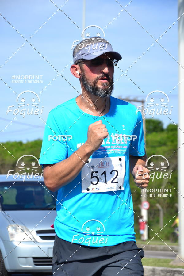 Buy your photos of the event21KES - Meia Maratona do Esprito Santo on Fotop