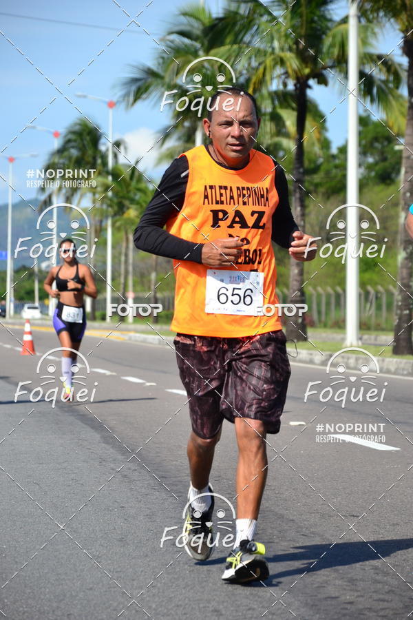Buy your photos of the event21KES - Meia Maratona do Esprito Santo on Fotop