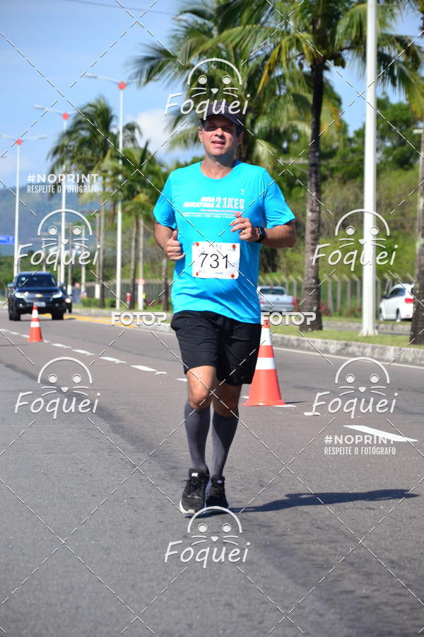 Buy your photos of the event21KES - Meia Maratona do Esprito Santo on Fotop